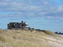 A classic shingle Hamptons house on a dune overlooking the Atlantic